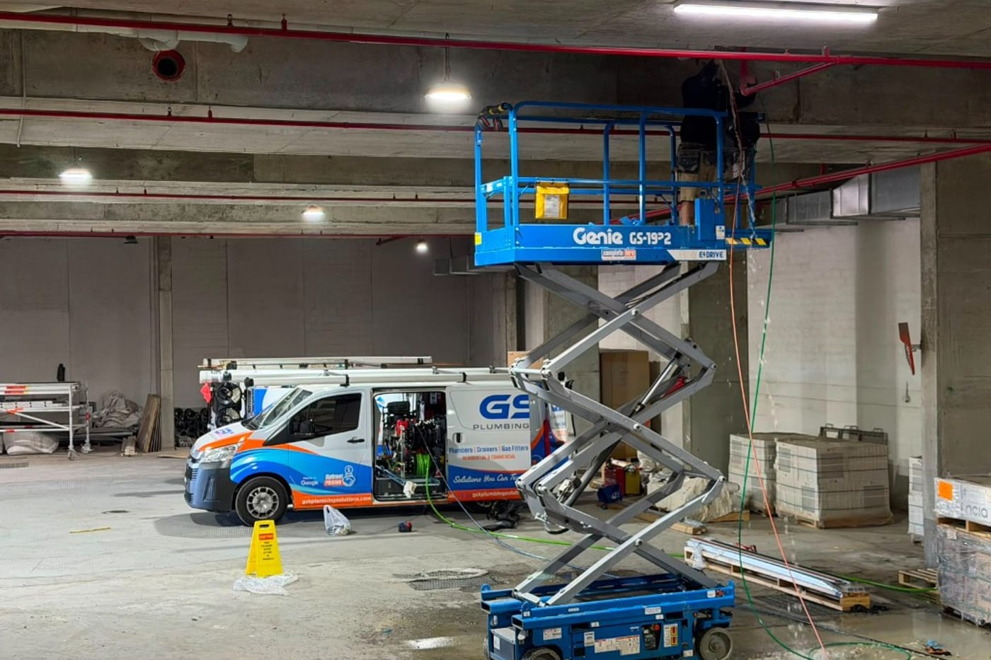GSK Plumbing Solutions commercial plumbing project with branded van
